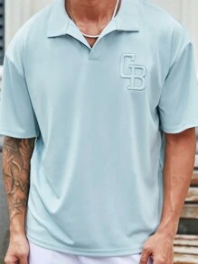 Manfinity Homme 男款天藍色鬆身Polo衫，配有刺繡領子