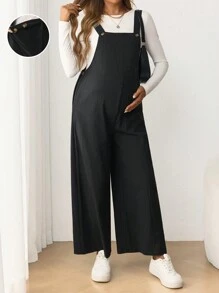 SHEIN Mono de maternidad casual con tirantes ajustables, pantalones nueve con botones laterales elásticos
