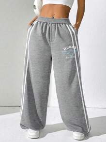 SHEIN Unity Pantalones deportivos con pierna ancha con letra gráfica y cinta en contraste a los costados - Gris - Ver 4