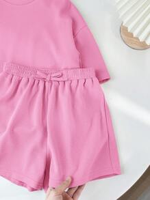 SHEIN LMoss Kids Bộ 2 món áo len tay ngắn trơn và quần short rộng rãi cho bé gái tuổi mới lớn LMoss - Màu Hồng  Dưa hấu - Xem 9