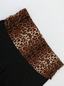 SHEIN EZwear Pantalones de estampado de leopardo de talla grande con pierna acampanada estrecha