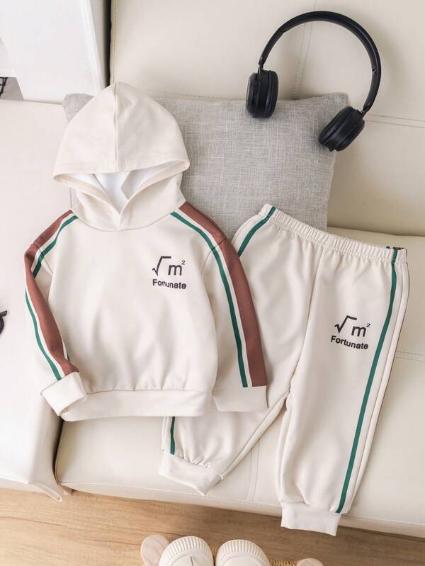 SHEIN Conjunto adorable de sudadera con capucha y pantalón largo con cintura elástica y diseño de bloques de color y letras impresas para bebé niño, otoño/invierno