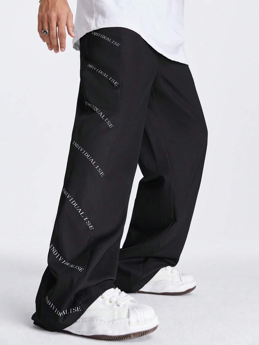 Manfinity NXTstreet Men's Loose Straight Woven Pants With Double-Sided English Print Designs - Black - View 1