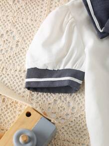 SHEIN 年轻女孩返校季休闲条纹衬衫，翻领、泡泡袖和 3D 蝴蝶结，适合日常穿着