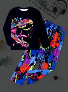 SHEIN Conjunto de pijama para casa de 2 piezas para niños preadolescentes con patrón de dinosaurios fosforescente de manga larga y pantalones largos cómodos y casuales con retardante de llama, para primavera/otoño - Negro - Ver 1