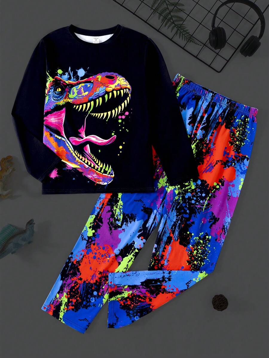 SHEIN Conjunto de pijama para casa de 2 piezas para niños preadolescentes con patrón de dinosaurios fosforescente de manga larga y pantalones largos cómodos y casuales con retardante de llama, para primavera/otoño - Negro - Ver 1