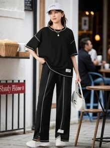 SHEIN Teen Girls Black & Contrast Thread Woven Patchwork Loose Knit T-Shirt And Wide-Leg Split Hem Pants 2pcs Outfits, Casual/Streetwear