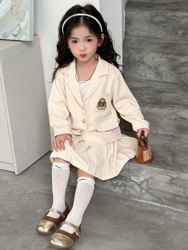 SHEIN 2pcs Set Back-To-School British Style Outfit For Toddler Girls - Long Sleeve Blazer With Lapel Collar, Badge Decor, Fake Pockets Paired With Pleated Mini Skirt, Casual And Formal Wear For Fall Season