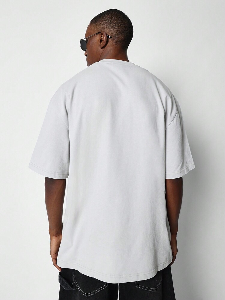 SUMWON 前面グラフィックプリント付き レギュラーフィット 半袖Tシャツ