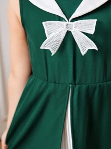 SHEIN Holiday,Summer,Travel  Young Girl Green Sleeveless Patchwork Dress . The Dress Is Mainly In Fresh Green, Showing A Natural And Energetic Atmosphere. There Is An Exquisite Bow On The Chest, Which Makes The Dress More Playful And Cute. The Patchwork Part Of The Skirt Is Made Of White Textured Fabric, Which Makes The Dress More Layered And Three-Dimensional. It Is Suitable For Daily Leisure, Outdoor Travel, Outdoor Activities, And Suitable For Spring And Summer Seasons. - Dark Green - View 5