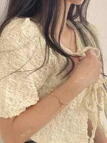 2025 Spring/Summer Girly Solid Color Cropped Tie-Up Cardigan