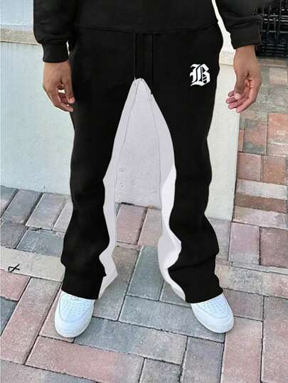 Manfinity EMRG Pantaloni della tuta da uomo con grafica a lettere e due tonalità, pantaloni della tuta a zampa con coulisse e blocchi di colore alla moda per uscire, adatti come regalo per marito o fidanzato