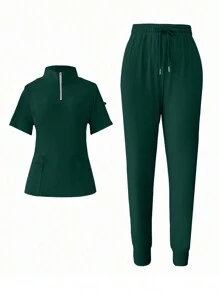 SHEIN Unity Conjunto de uniforme de scrubs con top de cuello alto de unicolor y pantalones ajustados - Azul Marino - Ver 1