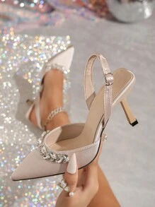 CUCCOO HITCHD Ladies' Apricot, Nude, And Ivory Colored Elegant High Heels For Dressy Occasions. It Features A Gorgeous Chain-Linked Shimmering Rhinestones Decoration And A Large Gemstone. The Shoes Are Made Of Luxurious Light Pink Satin With Pointed Silk Toe And Black High Heels. They Are Designed For Parties, Formal Events, And Weddings. Foldable Butterfly Orchid Flowers And Buckle Closure Add To The Beautification Of The Shoes. Spring Shoes Spring Break Easter Prom Heels For Christmas Elegant Shoes - Beige - View 3