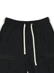 Manfinity Roghcode 宽松男士翻盖口袋侧边工装裤