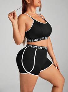 Easithlete Conjunto deportivo de ocio de talla grande con sujetador deportivo incorporado, shorts ajustados y levantadores de color negro y blanco empalmados