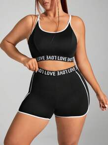 Easithlete Conjunto deportivo de ocio de talla grande con sujetador deportivo incorporado, shorts ajustados y levantadores de color negro y blanco empalmados
