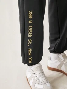 Manfinity VCAY Pantalones de punto sueltos para hombre con cinturilla elástica y puños acanalados, con patrón impreso en inglés de moda y para uso diario