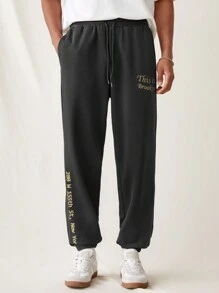 Manfinity VCAY Pantalones de punto sueltos para hombre con cinturilla elástica y puños acanalados, con patrón impreso en inglés de moda y para uso diario