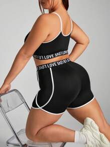 Easithlete Conjunto deportivo de ocio de talla grande con sujetador deportivo incorporado, shorts ajustados y levantadores de color negro y blanco empalmados