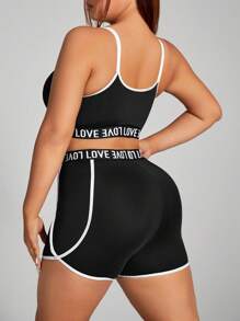 Easithlete Conjunto deportivo de ocio de talla grande con sujetador deportivo incorporado, shorts ajustados y levantadores de color negro y blanco empalmados