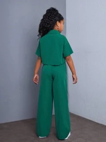 SHEIN Conjunto de camisa de manga corta holgada y casual de unicolor y pantalones anchos para niñas preadolescentes con bolsillos de parche
