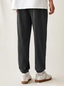 Manfinity VCAY Pantalones de punto sueltos para hombre con cinturilla elástica y puños acanalados, con patrón impreso en inglés de moda y para uso diario