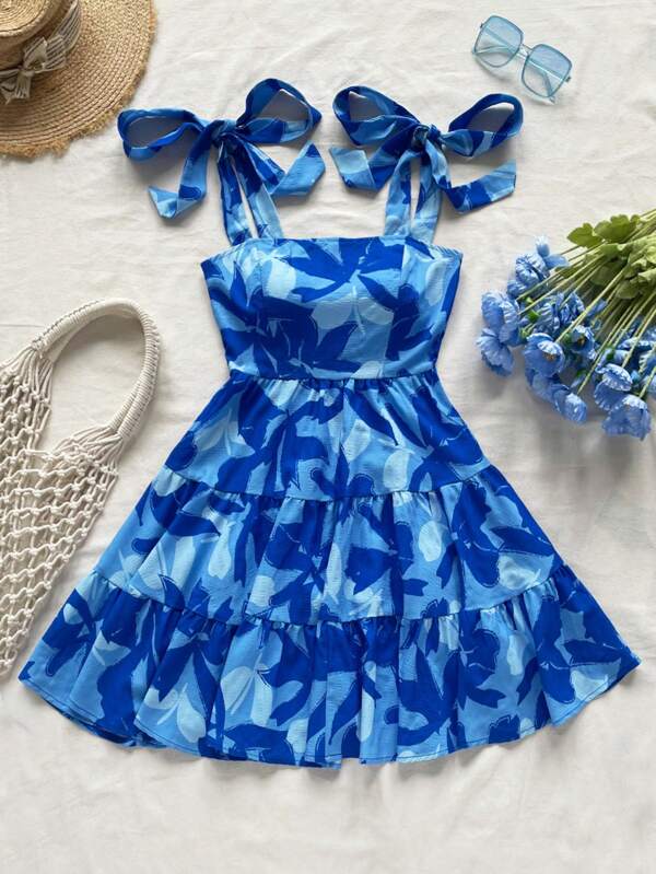 Soleia 1 pieza Vestido casual corto con volantes, de tiras y cintura con lazo, con estampado floral azul, adecuado para vacaciones y atuendos de vuelta al colegio, se puede usar por dentro o como prenda exterior