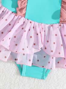 Bộ đồ bơi liền thân lưới nhún bèo màu hồng và xanh tương phản cho bé gái, có điểm nhấn là chiếc nơ xinh xắn, váy đi biển phong cách công chúa - Nhiều màu - Xem 4