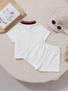 SHEIN Baby Jungen/Mädchen College Stil niedlicher gestrickter Cartoon Farbblock Polo Kurzarm Top und Shorts Set, geeignet für den Sommer