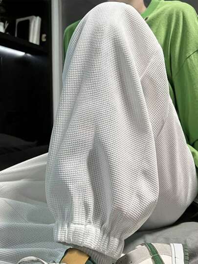 Männer Karottenhose mit schrägen Taschen