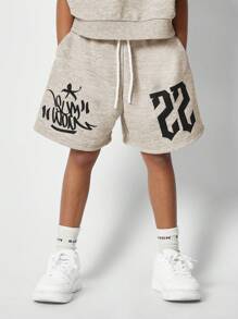 SUMWON Conjunto de 2 piezas con camiseta de manga corta y pantalón corto con estampado gráfico frontal para niñas preadolescentes