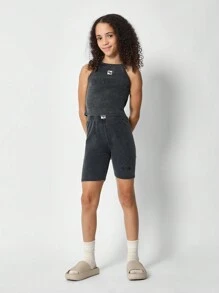 SUMWON Bộ 2 món áo ba lỗ hở vai và quần short cho bé gái tuổi mới lớn - màu đen - Xem 1