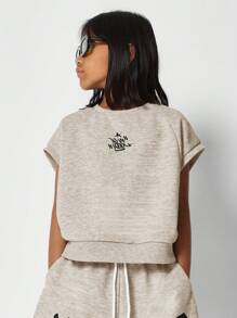 SUMWON Conjunto de 2 piezas con camiseta de manga corta y pantalón corto con estampado gráfico frontal para niñas preadolescentes