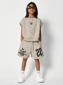 SUMWON Conjunto de 2 piezas con camiseta de manga corta y pantalón corto con estampado gráfico frontal para niñas preadolescentes