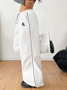 Coolane 繽紛Logo刺繡降落傘褲，適合春夏穿搭