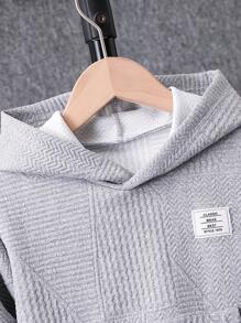 Young Boy Textured Knit Fleece Tracksuit, Suitable For 4-7 Years Old Boys To Wear During Outings, School And Sports In Autumn, Winter And Spring. The Tracksuit Is Made Of Textured Knit Fleece Material, Which Is Warm And Comfortable. The Hoodie Is Designed With A Hood, Enhancing The Fashion Sense And Warmth. It Is Suitable For Boys To Wear On Various Occasions, Not Only Fashionable But Also Practical, And Allowing Easy Movement. When Boys Wear This Tracksuit, Whether It's Outdoor Activities, Going To School, Or Exercising, They Can Show Off A Fashionable And Stylish Image. This Tracksuit Will Become A Fashionable And Warm Item In The Young Boy Wardrobes, Providing More Choices For Their Daily Wear!