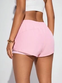 SHEIN Sports Short de sport casual femme, couleur unie, avec cordon de serrage à la taille et poches, jupe de tennis