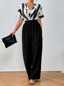 Chiquease Enterizo negro elegante con mangas cortas con impresión gráfica en contraste blanco y negro con corte aleatorio para el verano y escote en V - Albaricoque - Ver 3