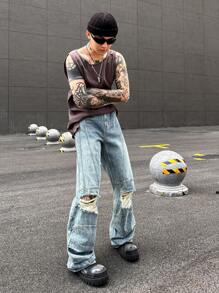 Manfinity Roghcode Y2K復古街頭風格男士中藍色洗水染污損寬腳寬鬆牛仔褲，帶沙漠風格