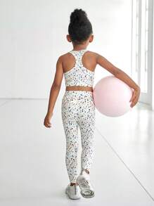 SHEIN 2 件套少女圆点印花运动套装，包括紧身背心和裤子