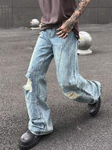 Manfinity Roghcode Y2K復古街頭風格男士中藍色洗水染污損寬腳寬鬆牛仔褲，帶沙漠風格