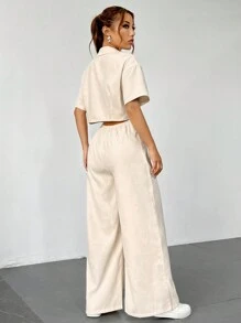 Flirla 女式翻領短袖純色鈕釦連體褲，優雅時尚，潮流酷感