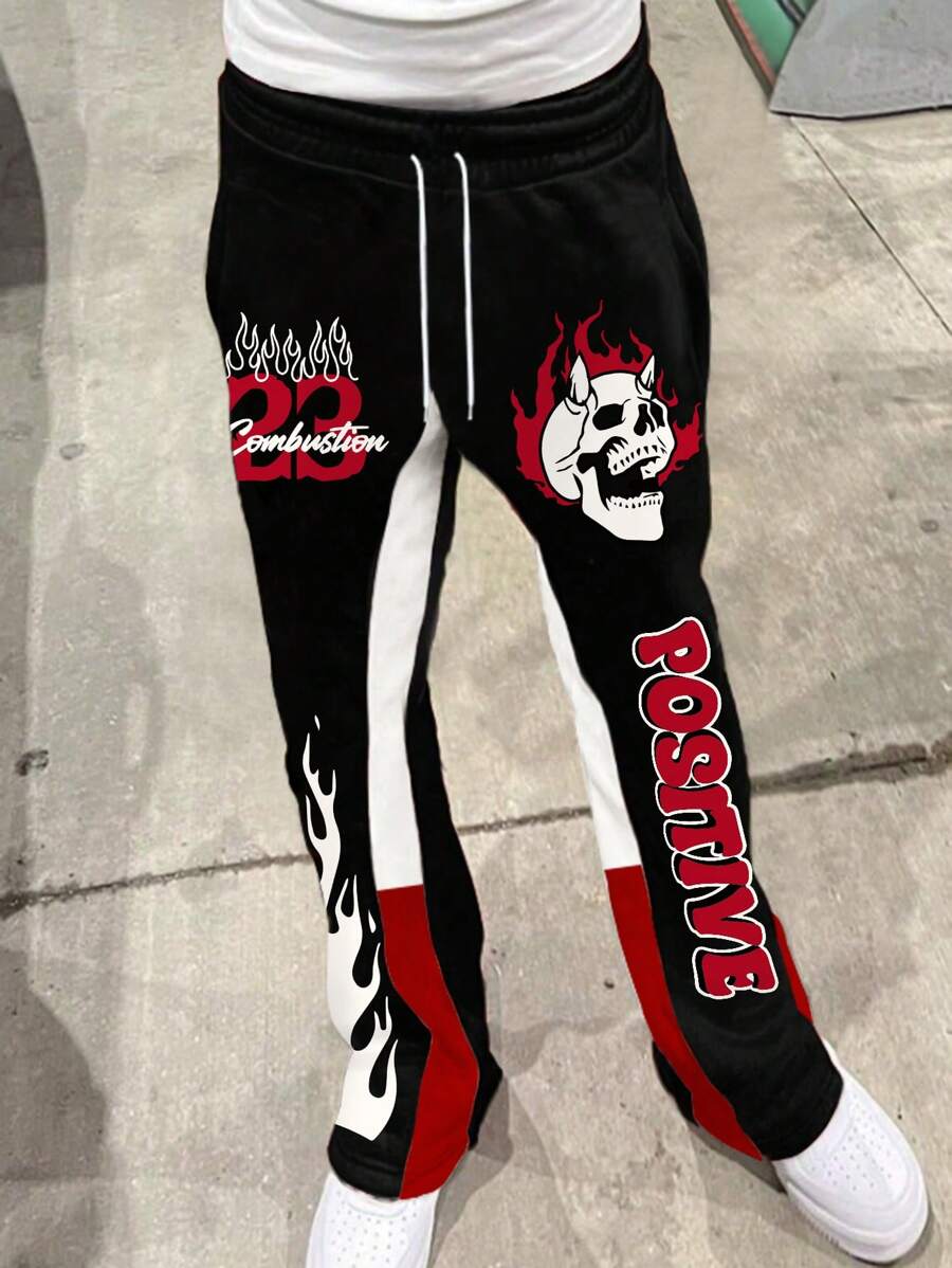 Manfinity EMRG Black Streetwear Color Block Skull Flame Printed Drawstring Jogger Pants, Graphic Sweatpants, Black And Red Sweatpants, Flame Sweatpants - Multicolor - View 1