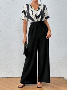 Chiquease Enterizo negro elegante con mangas cortas con impresión gráfica en contraste blanco y negro con corte aleatorio para el verano y escote en V - Albaricoque - Ver 4