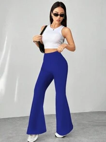 Flirla Pantalones acampanados con textura de pata de gallo en blanco y negro