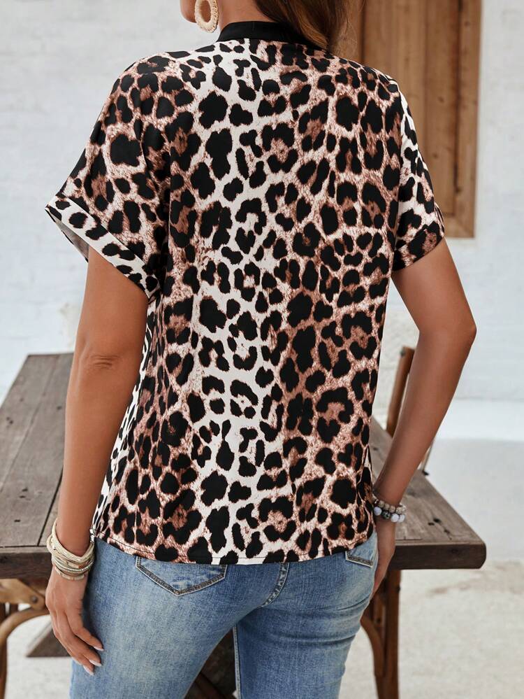 Women's Short Sleeve Shirt With V-Neckline Cutout And Leopard Print Front Button Closure