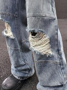 Manfinity Roghcode Y2K復古街頭風格男士中藍色洗水染污損寬腳寬鬆牛仔褲，帶沙漠風格