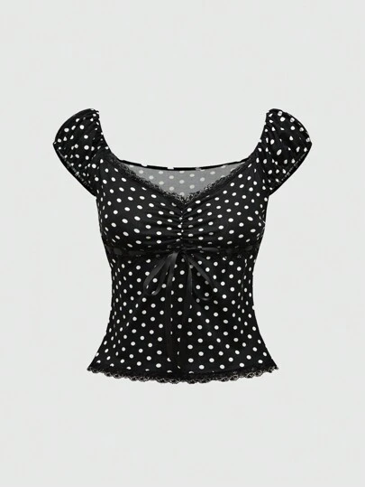 Goth قميص نسائي برقبة V ونقشة النقط بزينة عقدة، يمتاز بقصّته الضيّقة وإمكانية ارتدائه لمناسبات مختلفة