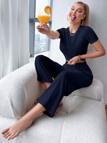 Conjunto informal de camiseta de manga corta y cuello redondo de unicolor, y pantalones con nudo en la cintura para mujer, conjunto de salón de verano